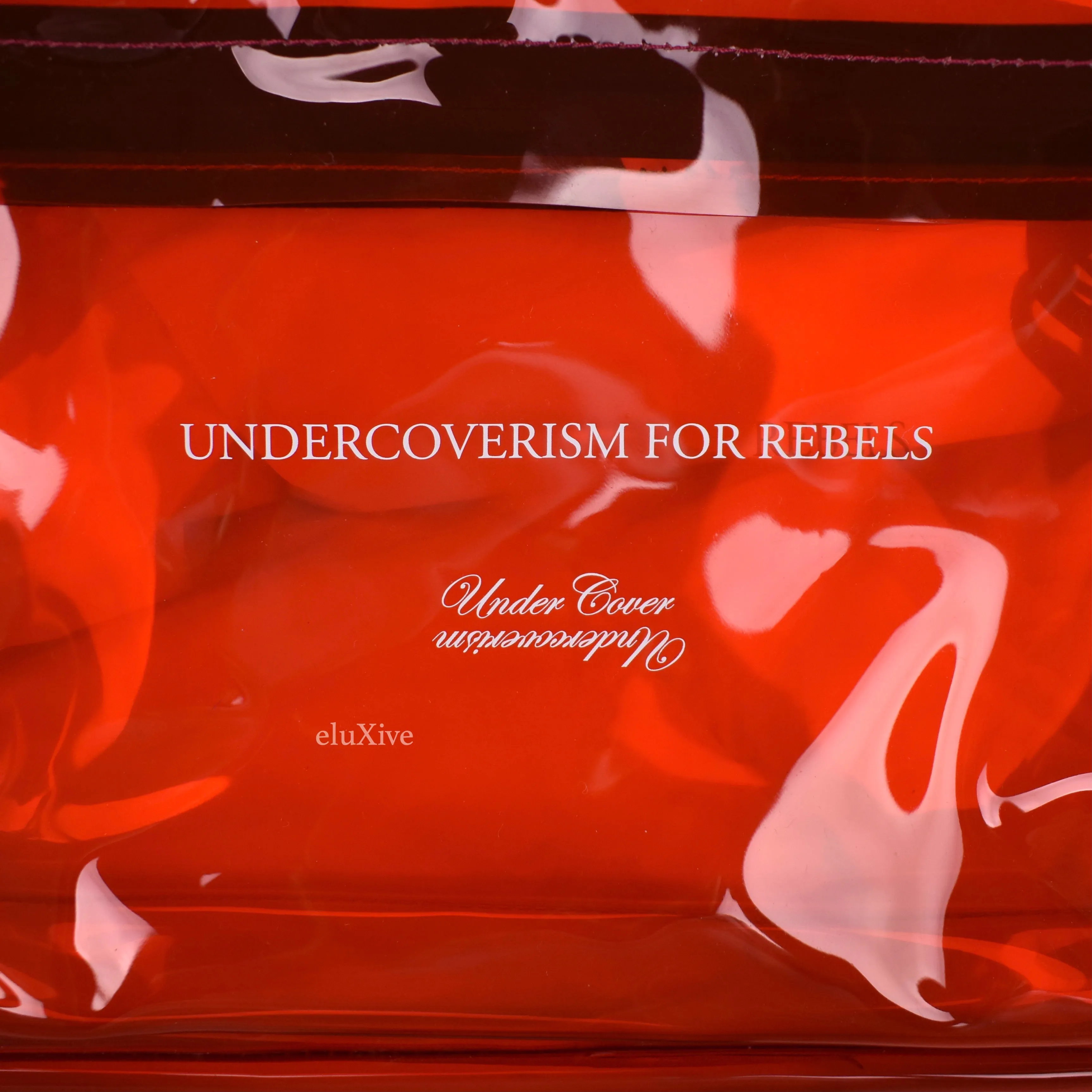 Undercover - Transparent Red PVC Backpack
