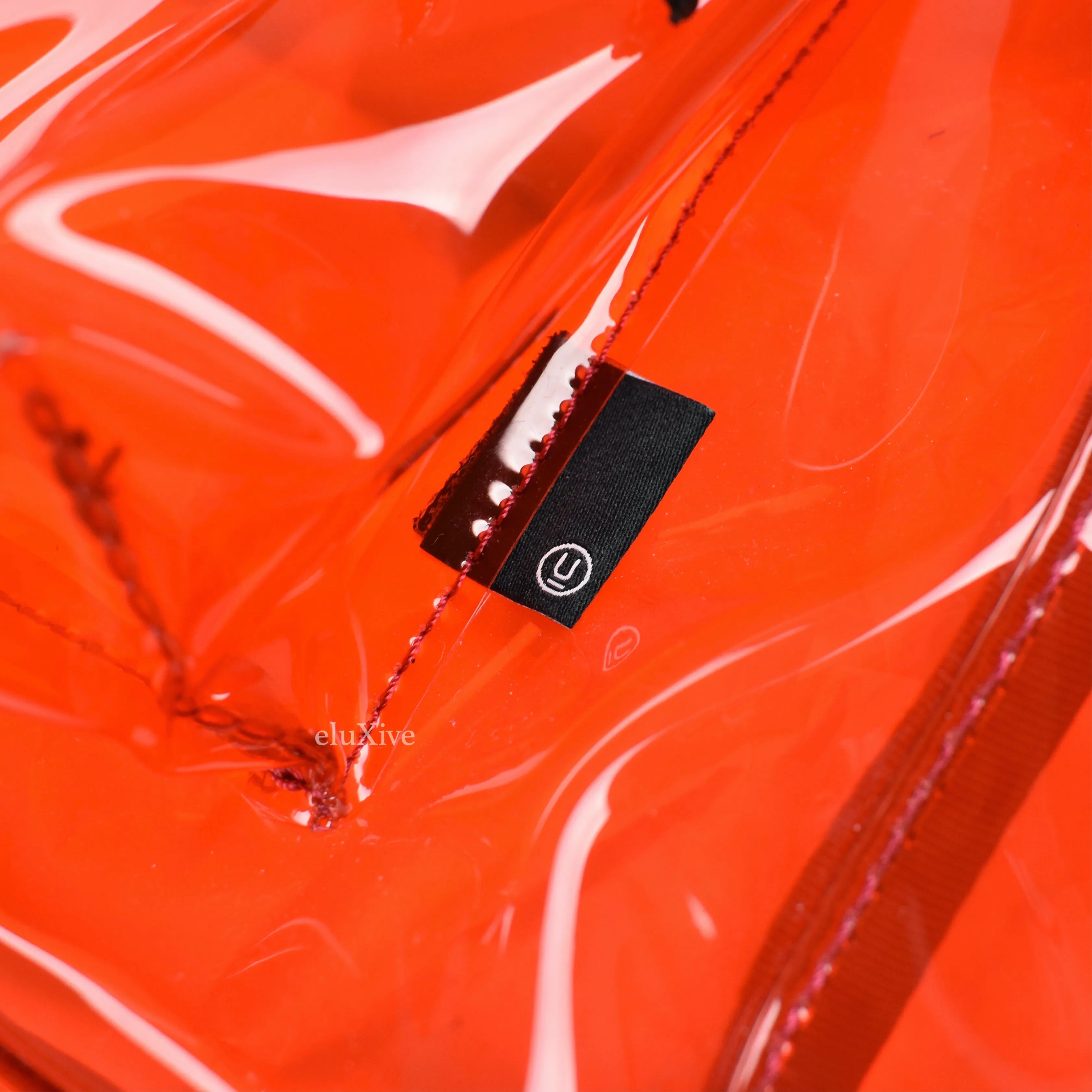 Undercover - Transparent Red PVC Backpack
